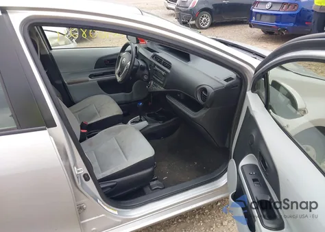 2014 Toyota Prius C One from USA, damaged, VIN JTDKDTB36E1075986